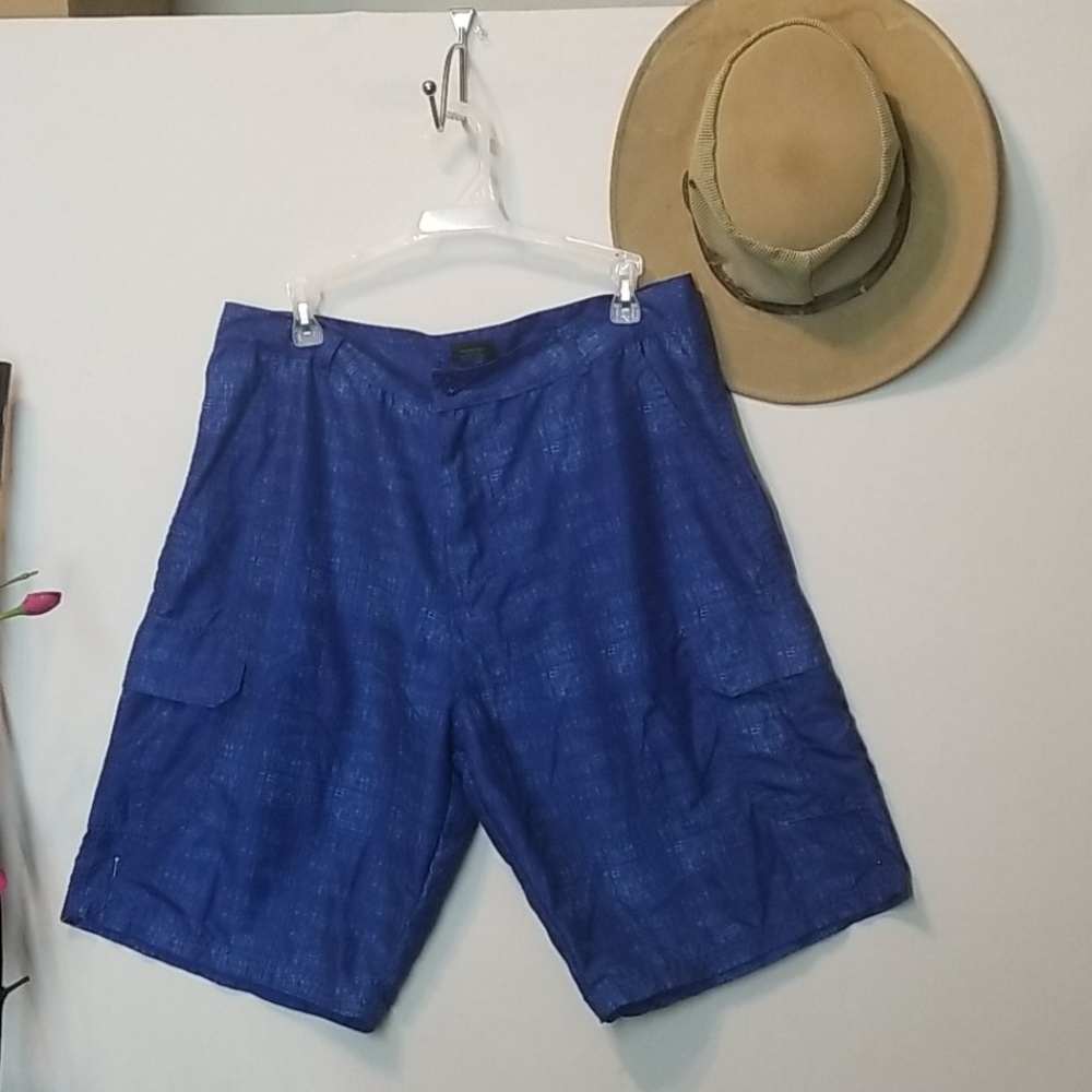 BLUE GEAR SWIM TRUNKS.